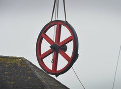 Wheel being craned into position